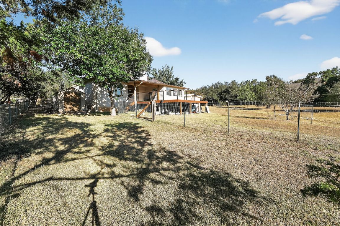 1021 Westland Ridge Road Dripping Springs, TX 78620 - Photo 31 of 31 a view of a yard with a tree