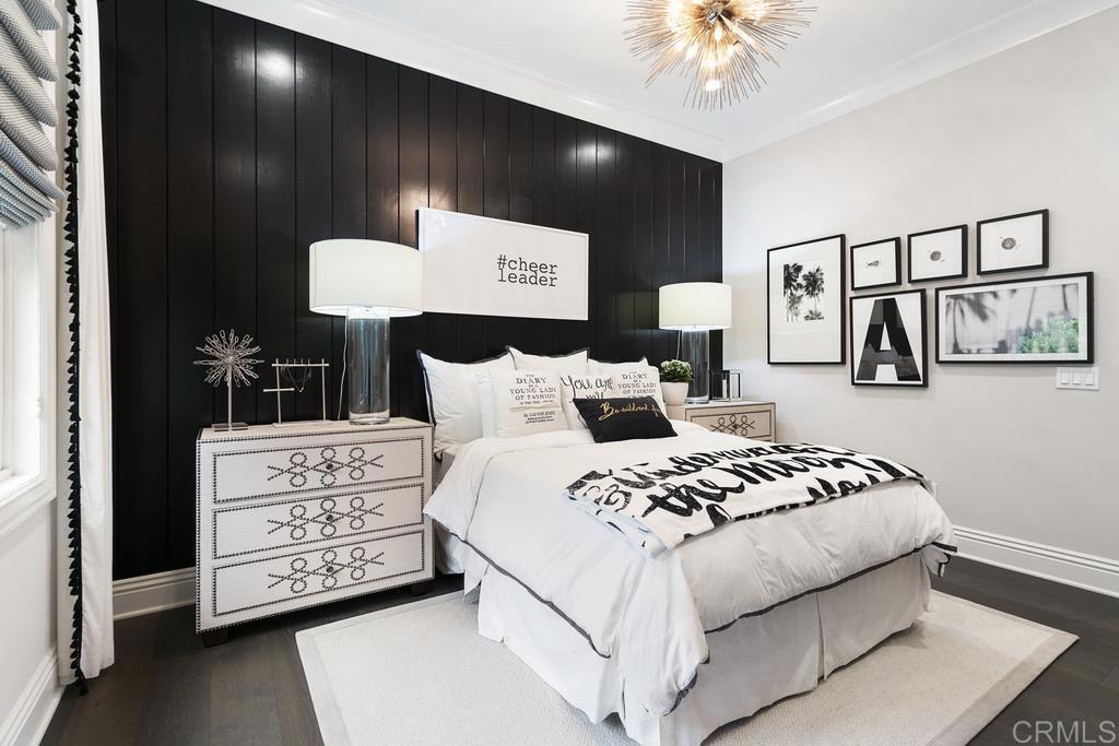 15527 Artesian Ridge San Diego, CA 92127 - Photo 14 of 32 a bedroom with a bed and a chandelier