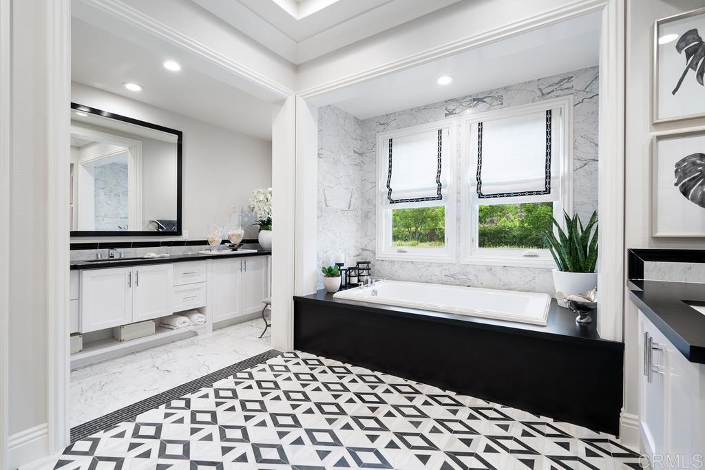 15527 Artesian Ridge San Diego, CA 92127 - Photo 18 of 32 a kitchen with a sink and large window