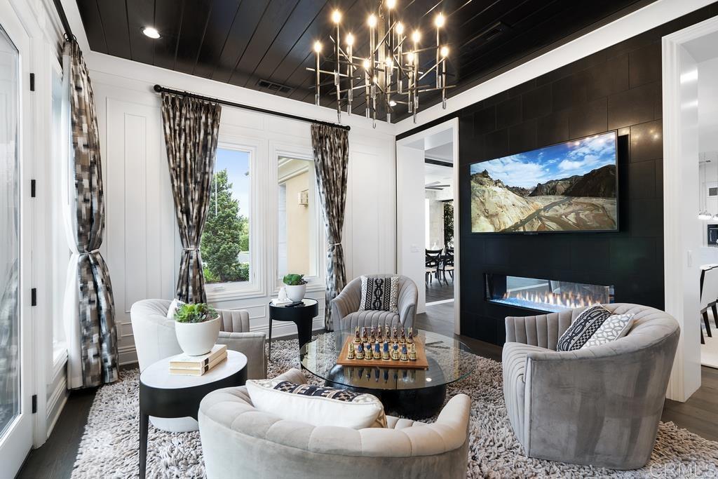15527 Artesian Ridge San Diego, CA 92127 - Photo 7 of 32 a living room with furniture and a large window