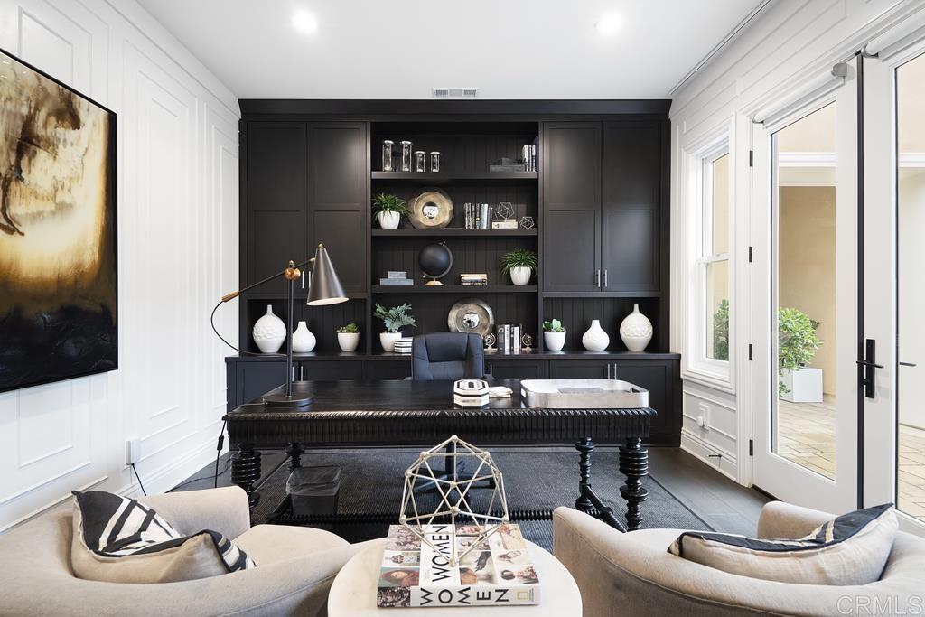 15527 Artesian Ridge San Diego, CA 92127 - Photo 8 of 32 a living room with furniture and a flat screen tv