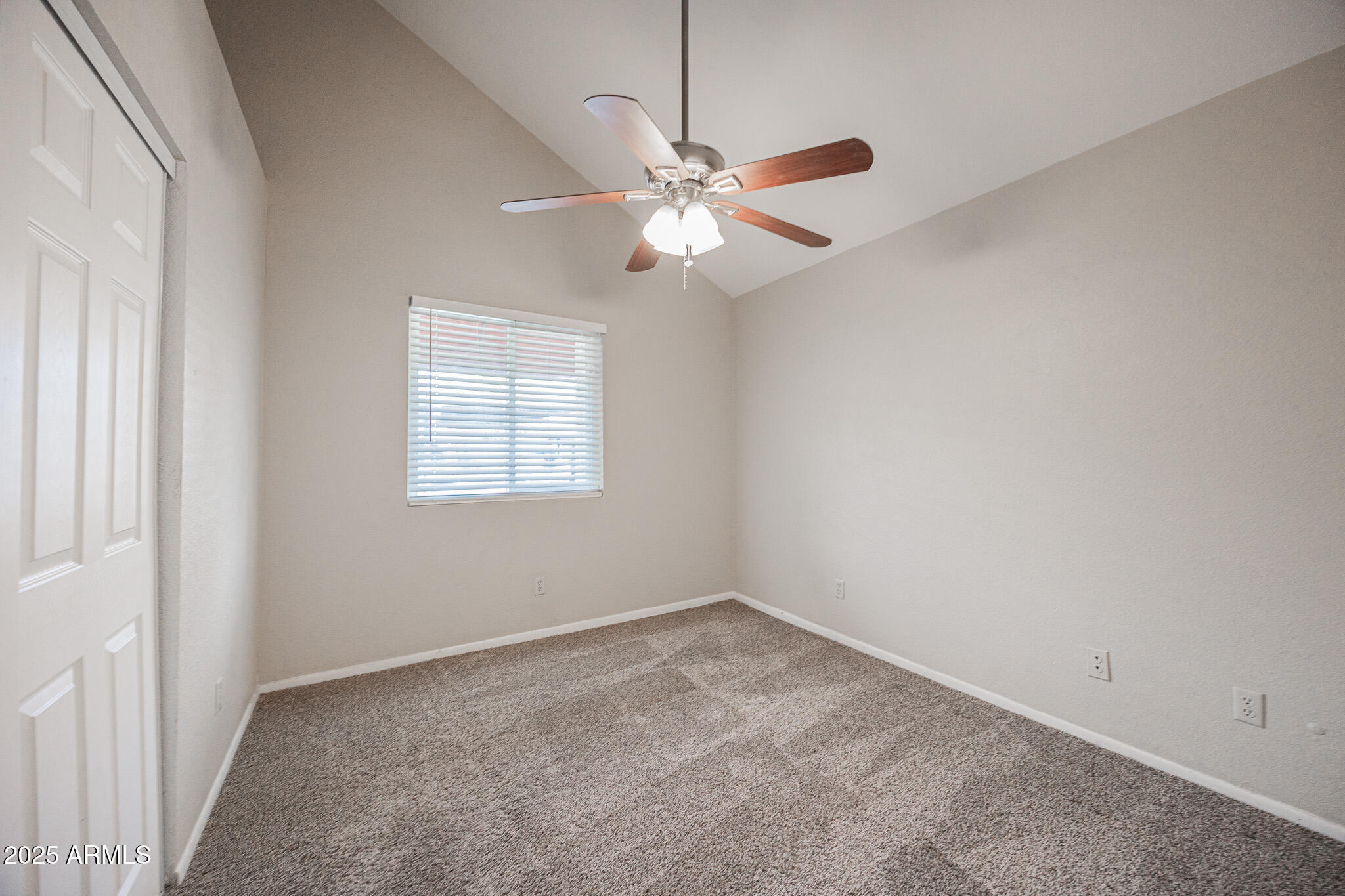 2127 East 10th Street, Unit 4 Tempe, AZ 85281 - Photo 12 of 21 an empty room with windows and fan