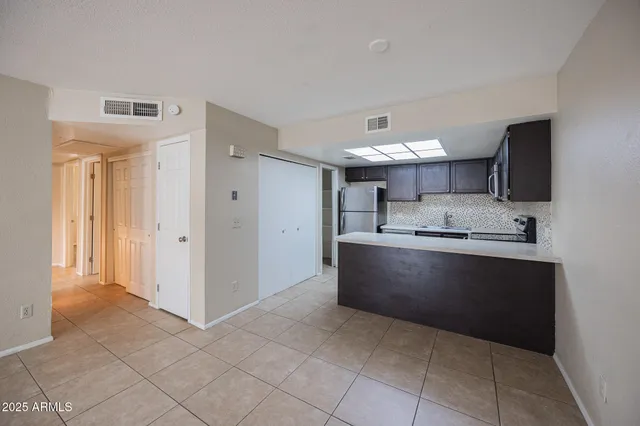 a large bathroom with a large tub and sink