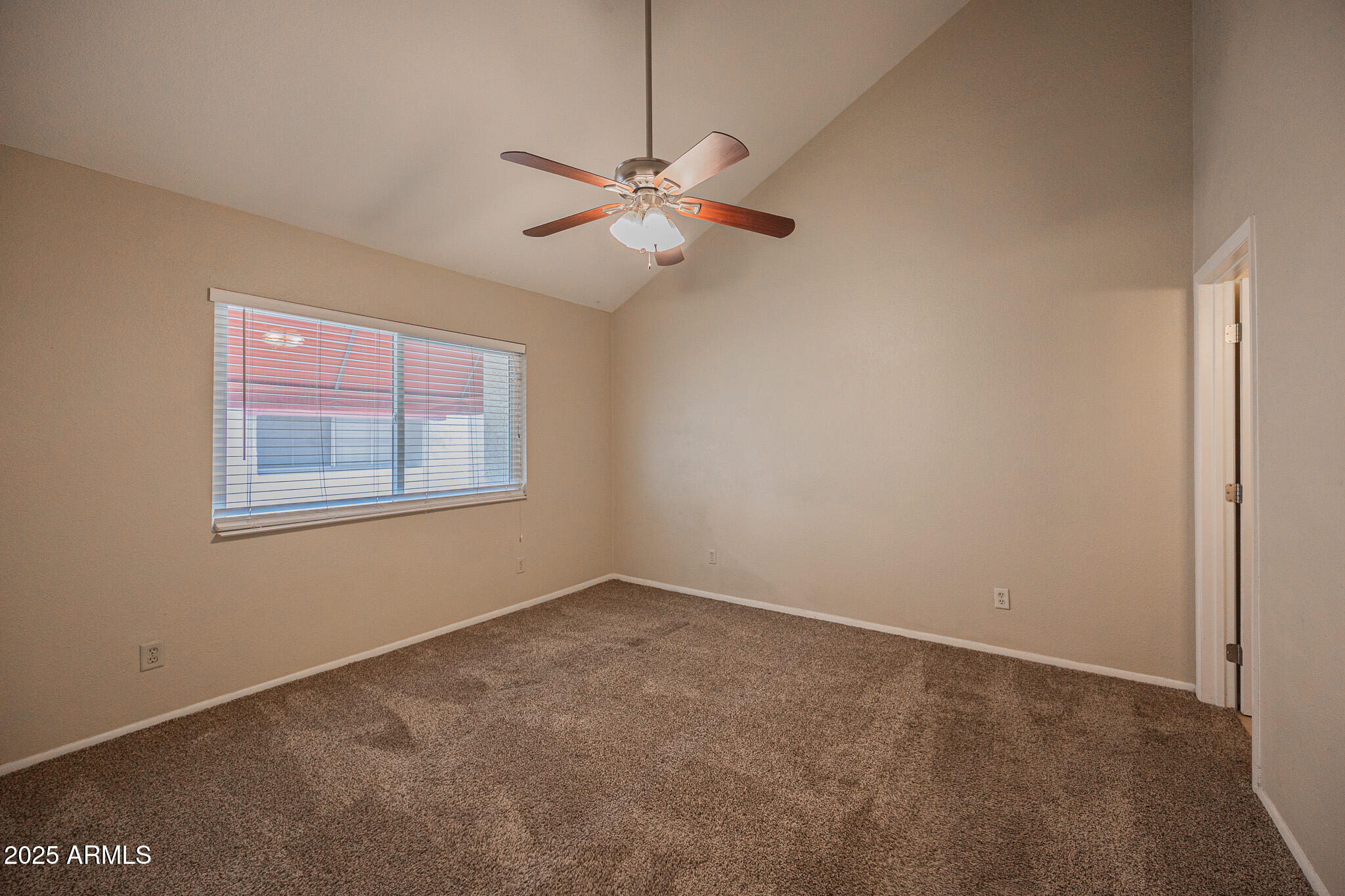 2127 East 10th Street, Unit 4 Tempe, AZ 85281 - Photo 9 of 21 a view of an empty room with a window