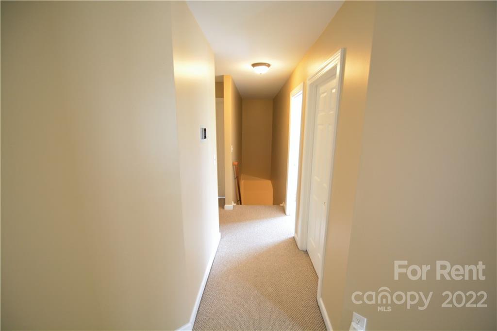 2127 Copperplate Road Charlotte, NC 28262 - Photo 24 of 37 a view of a hallway
