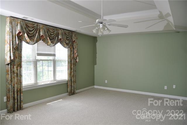 2127 Copperplate Road Charlotte, NC 28262 - Photo 25 of 37 a view of an empty room with a window