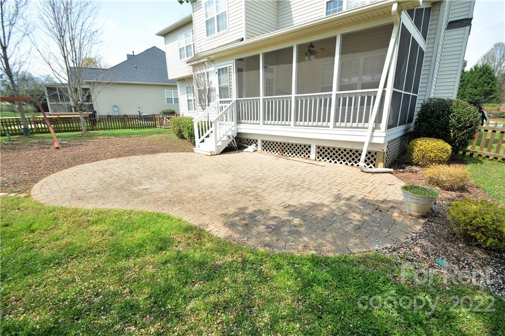 2127 Copperplate Road Charlotte, NC 28262 - Photo 35 of 37 a front view of a house with a yard