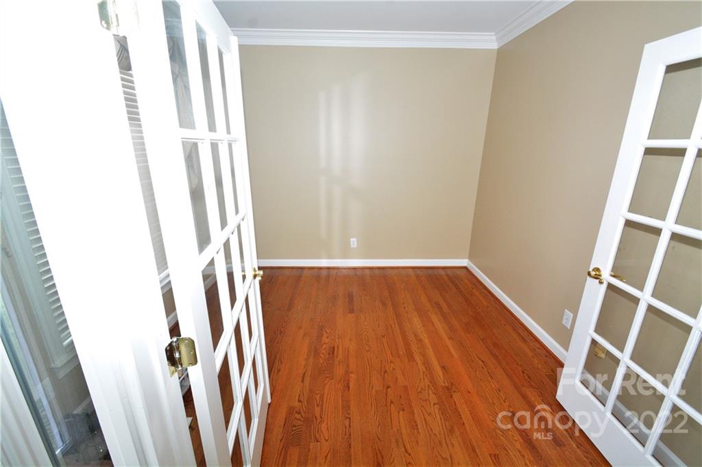 2127 Copperplate Road Charlotte, NC 28262 - Photo 6 of 37 a view of wooden floor in a room