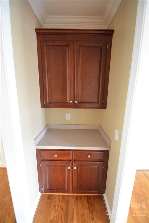 2127 Copperplate Road Charlotte, NC 28262 - Photo 9 of 37 view of wooden cabinets