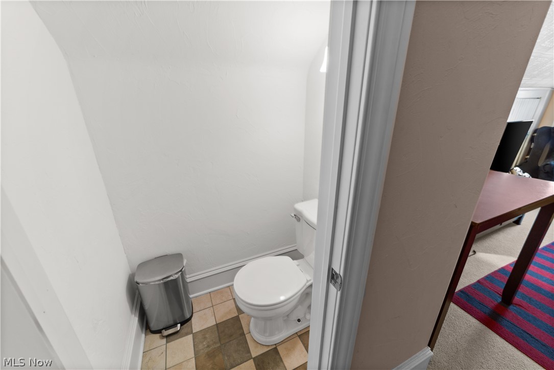 1680 Lee Road Cleveland, OH 44118 - Photo 37 of 45 Bathroom featuring toilet and tile floors