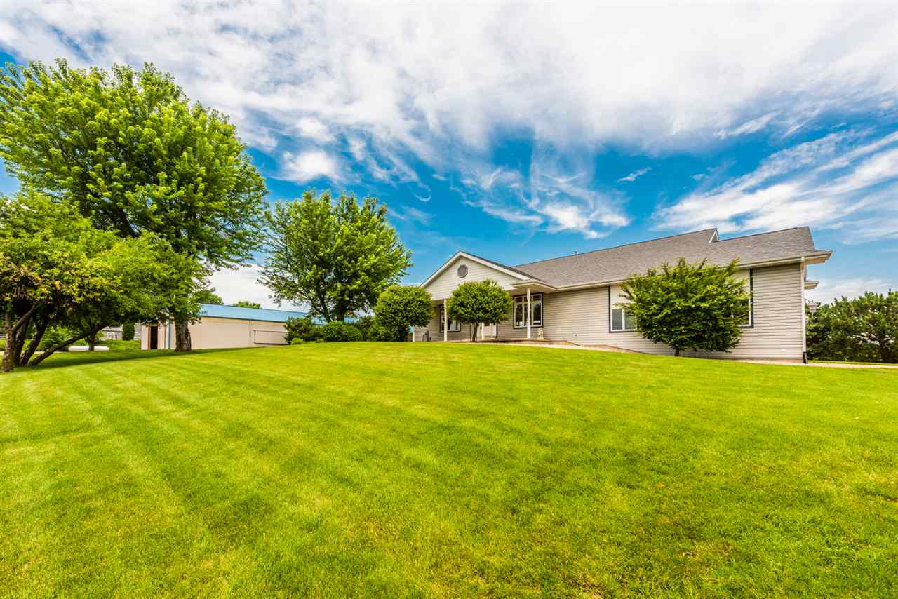 a house view with a garden space