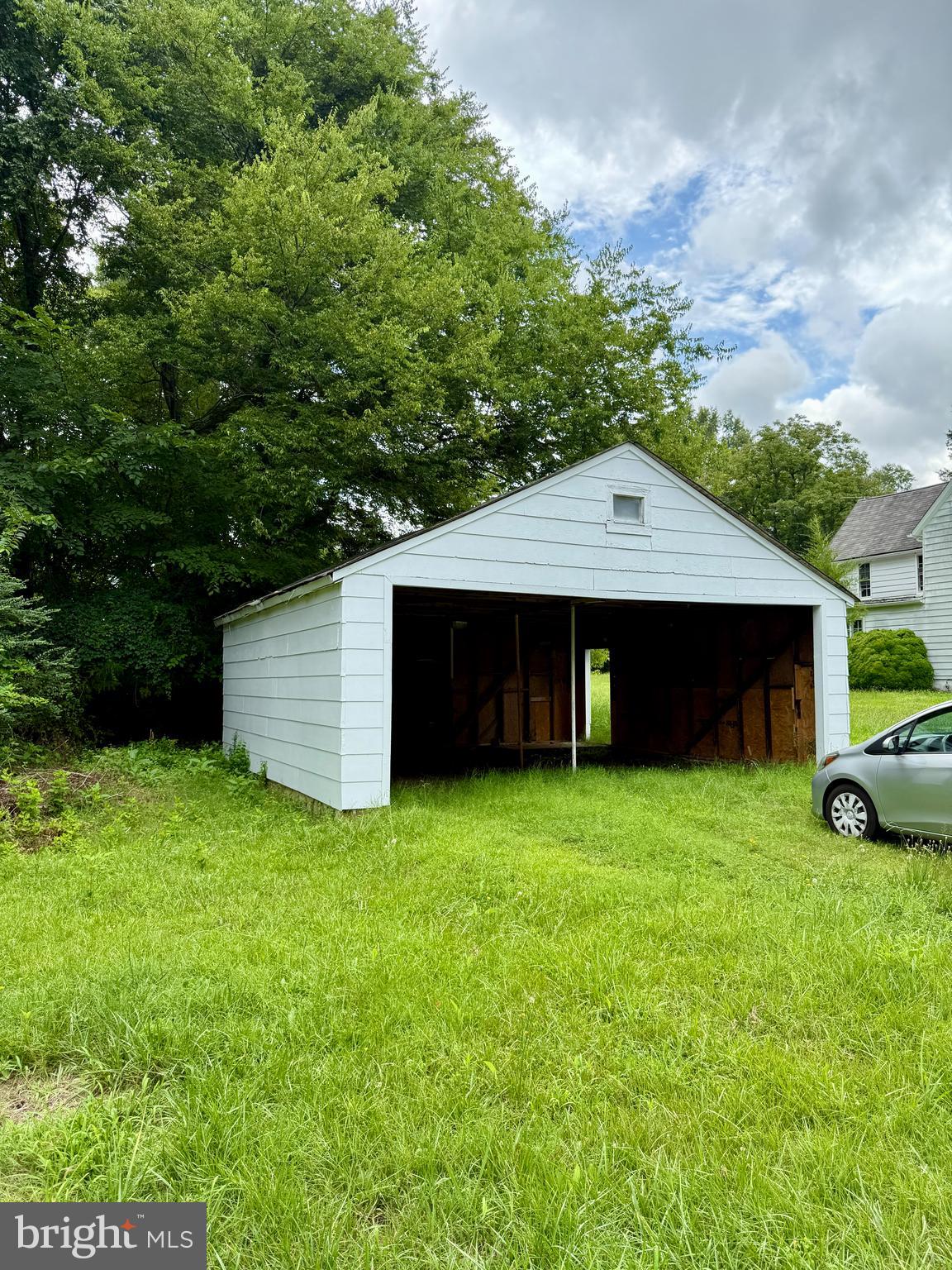 1031 MacDonald Road Scottsburg, VA 24589 - Photo 13 of 43 a backyard of a house with lots of green space