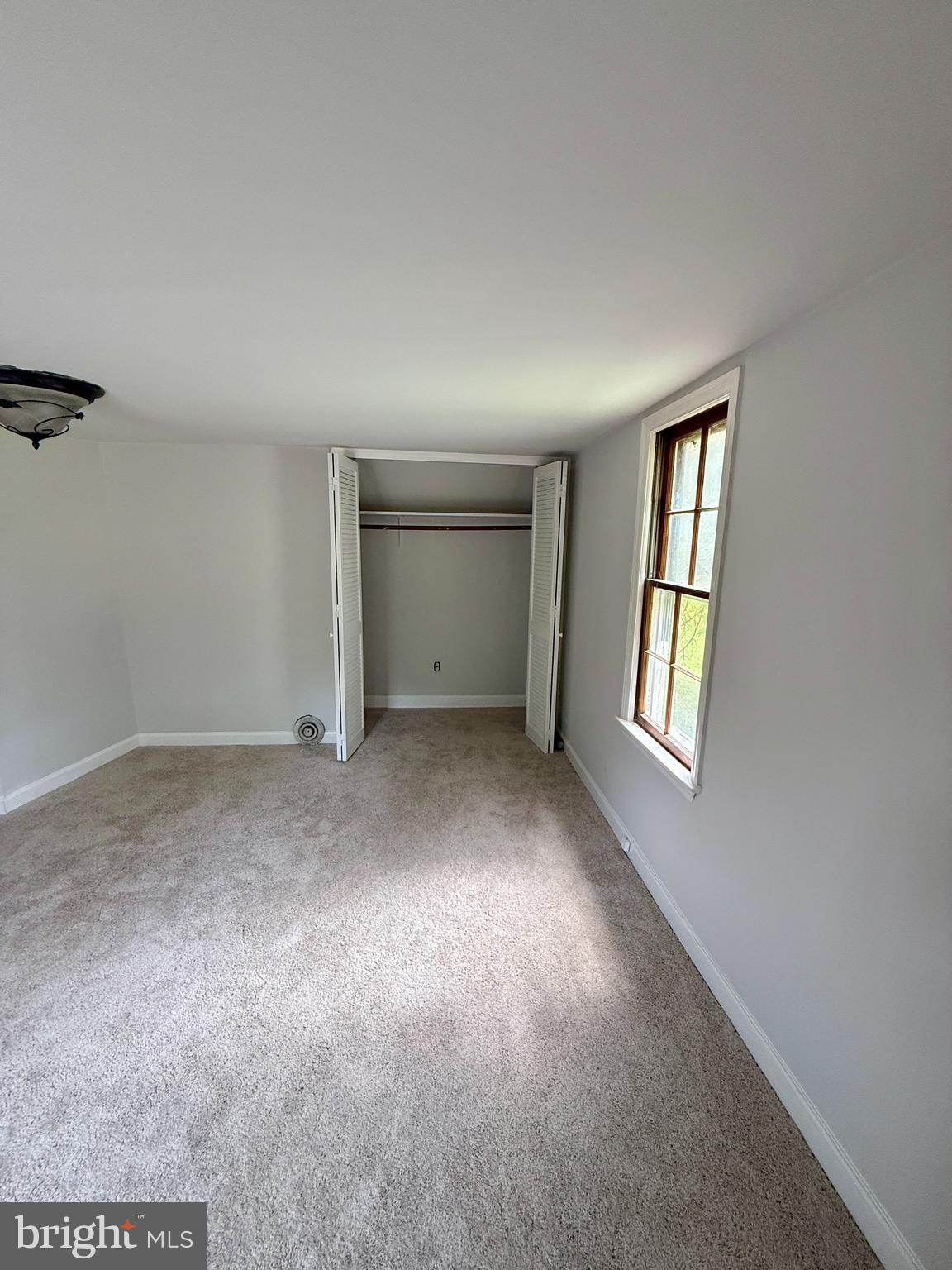1031 MacDonald Road Scottsburg, VA 24589 - Photo 24 of 43 an empty room with windows