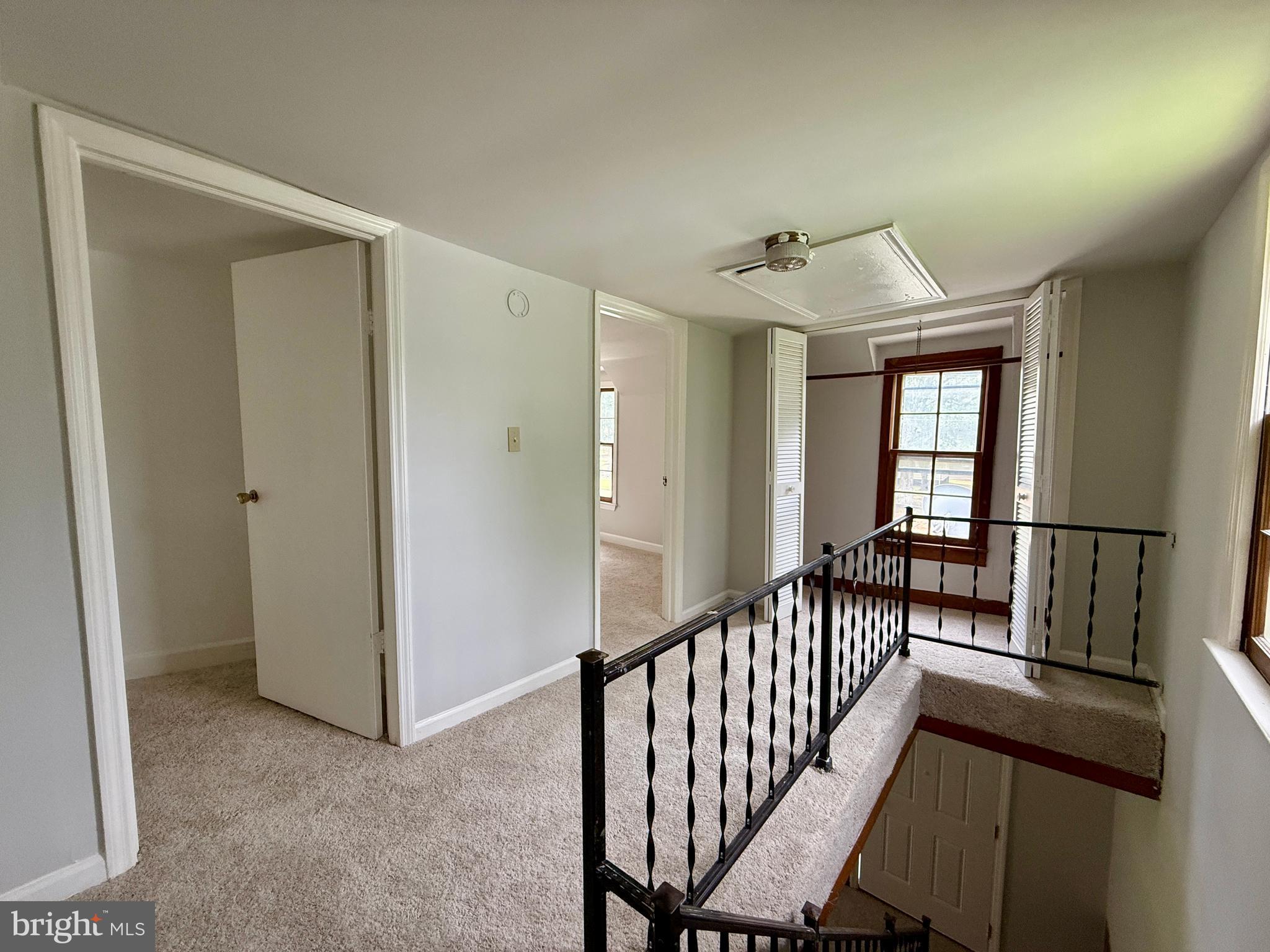 1031 MacDonald Road Scottsburg, VA 24589 - Photo 27 of 43 a view of a hallway to a livingroom and a livingroom with furniture