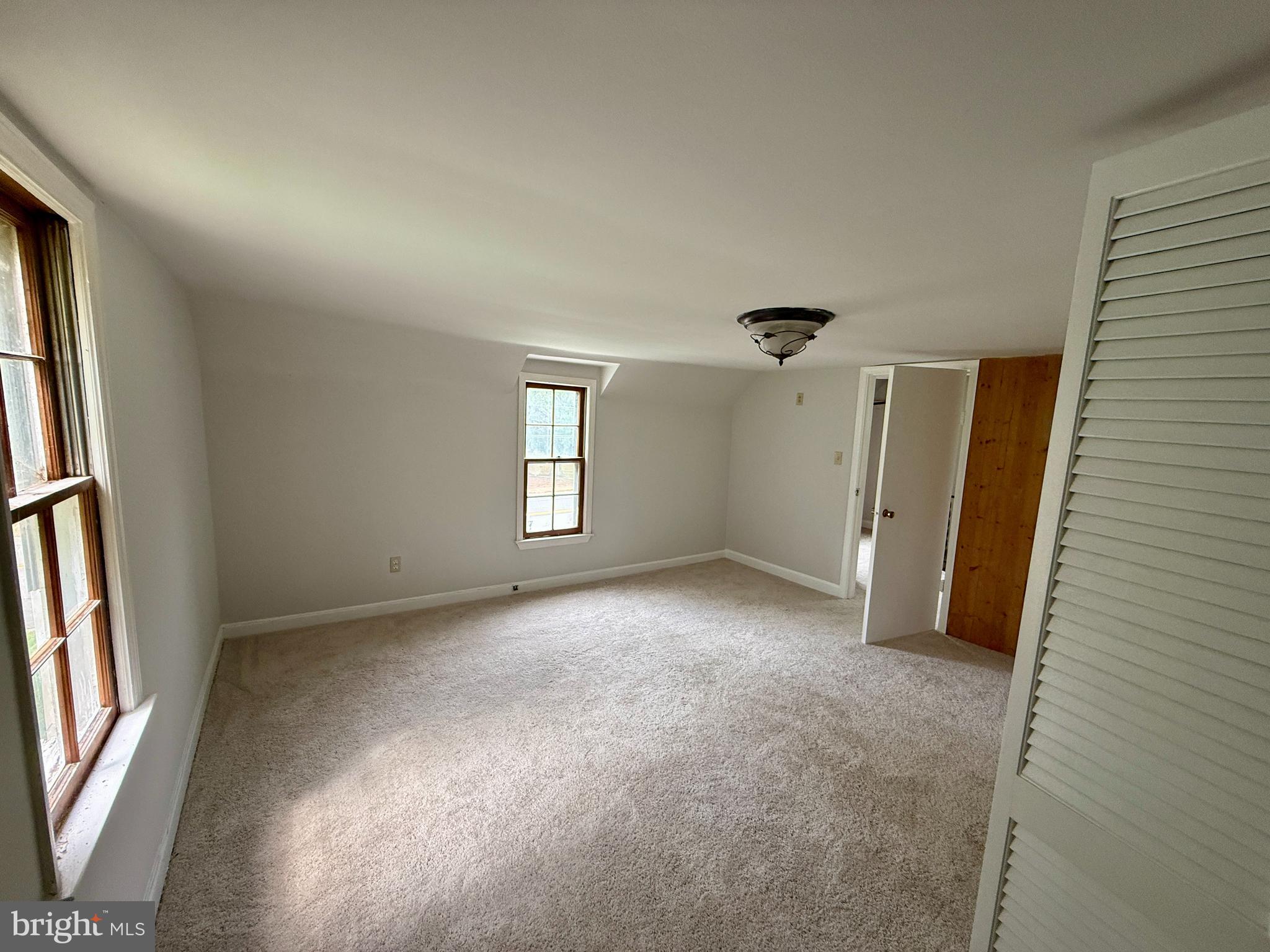 1031 MacDonald Road Scottsburg, VA 24589 - Photo 29 of 43 an empty room with windows
