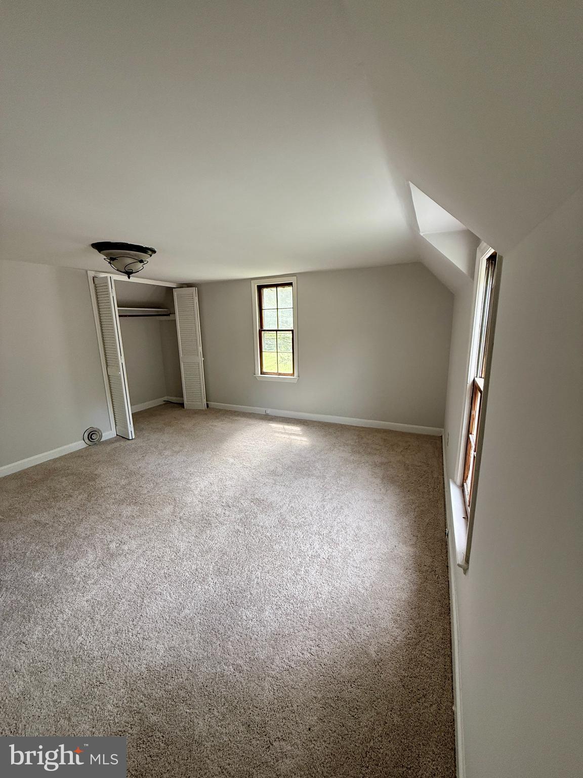 1031 MacDonald Road Scottsburg, VA 24589 - Photo 39 of 43 an empty room with windows
