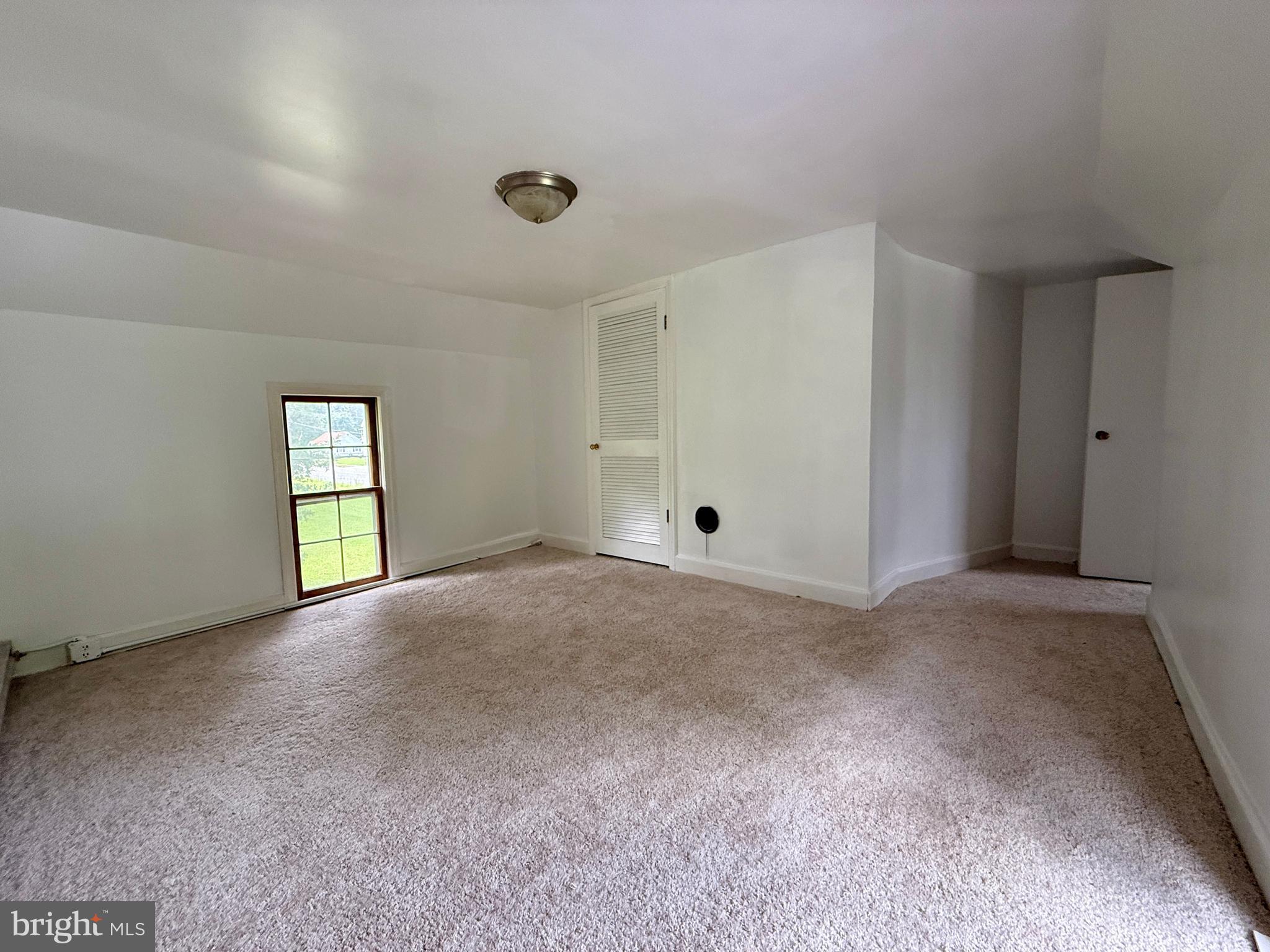 1031 MacDonald Road Scottsburg, VA 24589 - Photo 41 of 43 a view of an empty room and window
