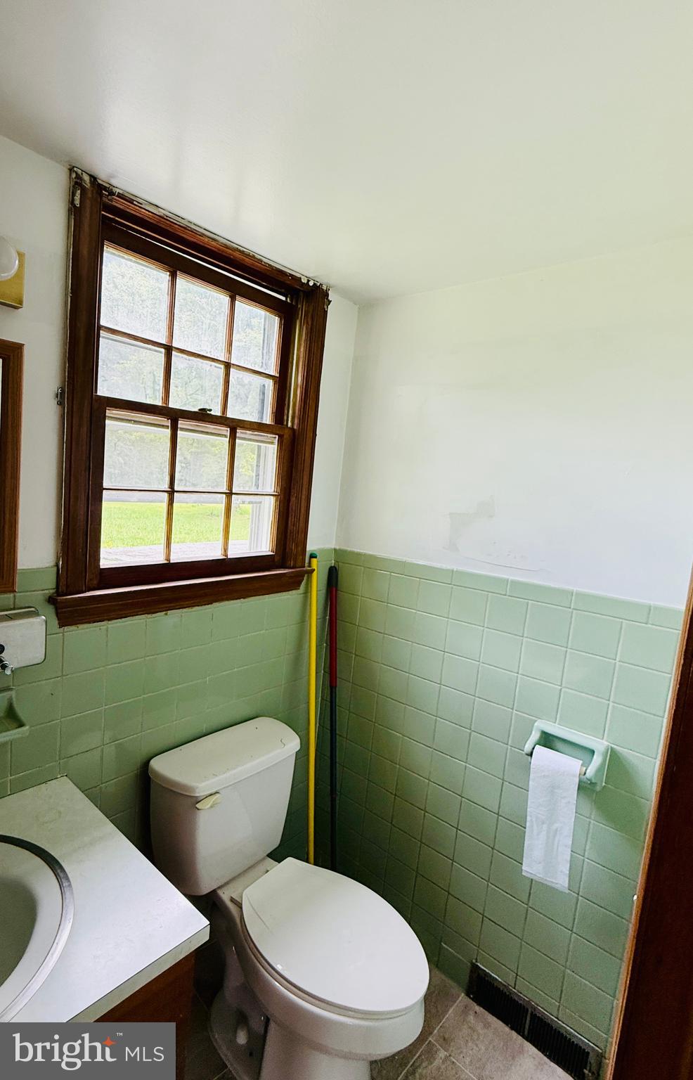 1031 MacDonald Road Scottsburg, VA 24589 - Photo 43 of 43 a bathroom with a toilet and a sink