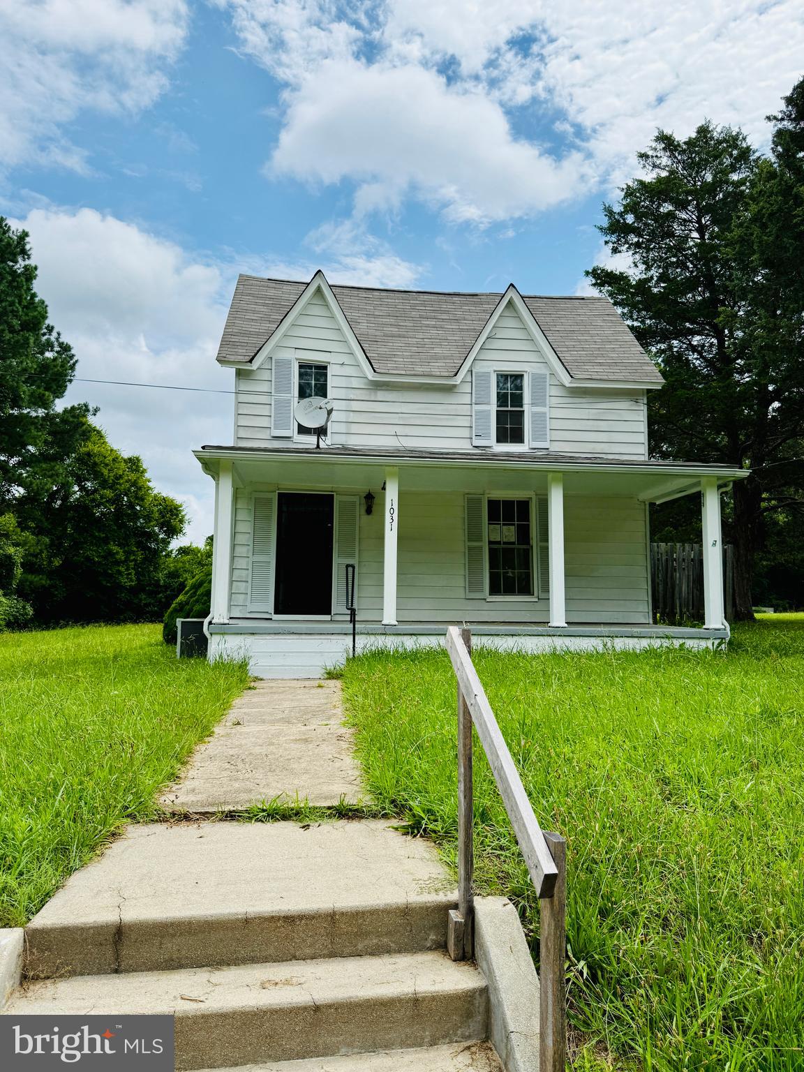 1031 MacDonald Road Scottsburg, VA 24589 - Photo 5 of 43 front view of a house with a yard