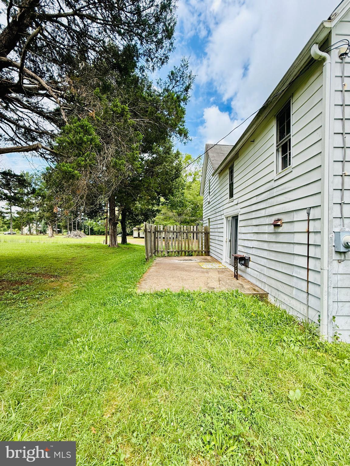 1031 MacDonald Road Scottsburg, VA 24589 - Photo 8 of 43 a view of a house with a yard