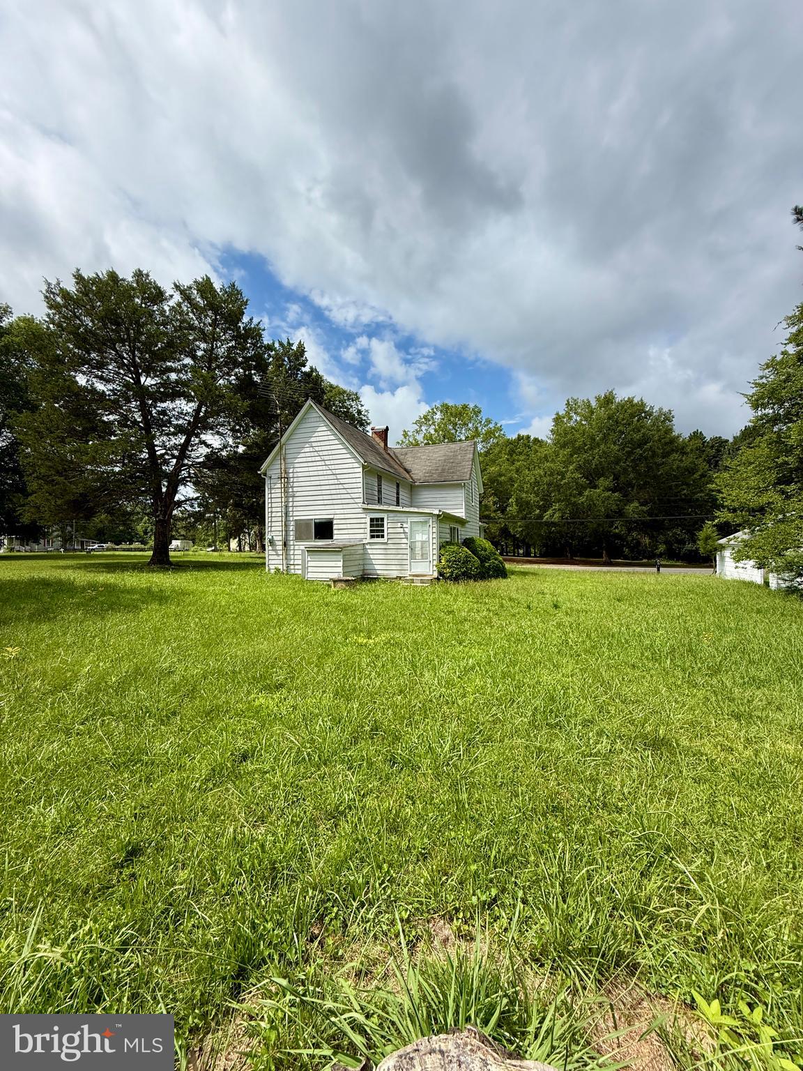 1031 MacDonald Road Scottsburg, VA 24589 - Photo 10 of 43 a view of a house with a yard