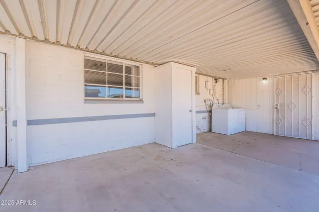 a view of empty room with windows
