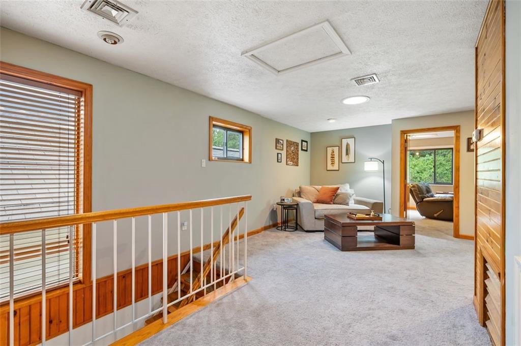 121 Frazier Avenue McKees Rocks, PA 15136 - Photo 15 of 29 a living room with furniture and windows