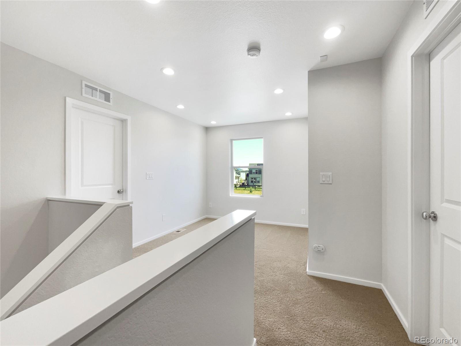 12825 Eagle River Road Firestone, CO 80504 - Photo 25 of 32 a view of an empty room and window