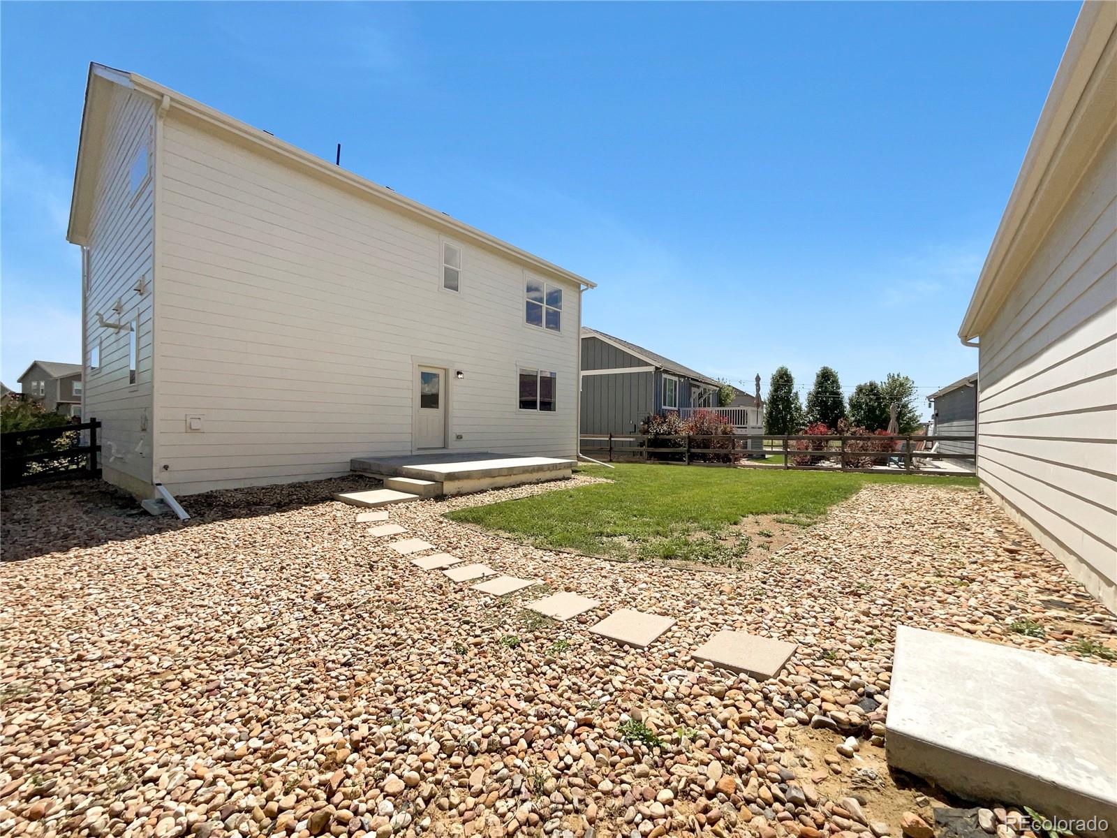 12825 Eagle River Road Firestone, CO 80504 - Photo 28 of 32 a view of house with backyard space