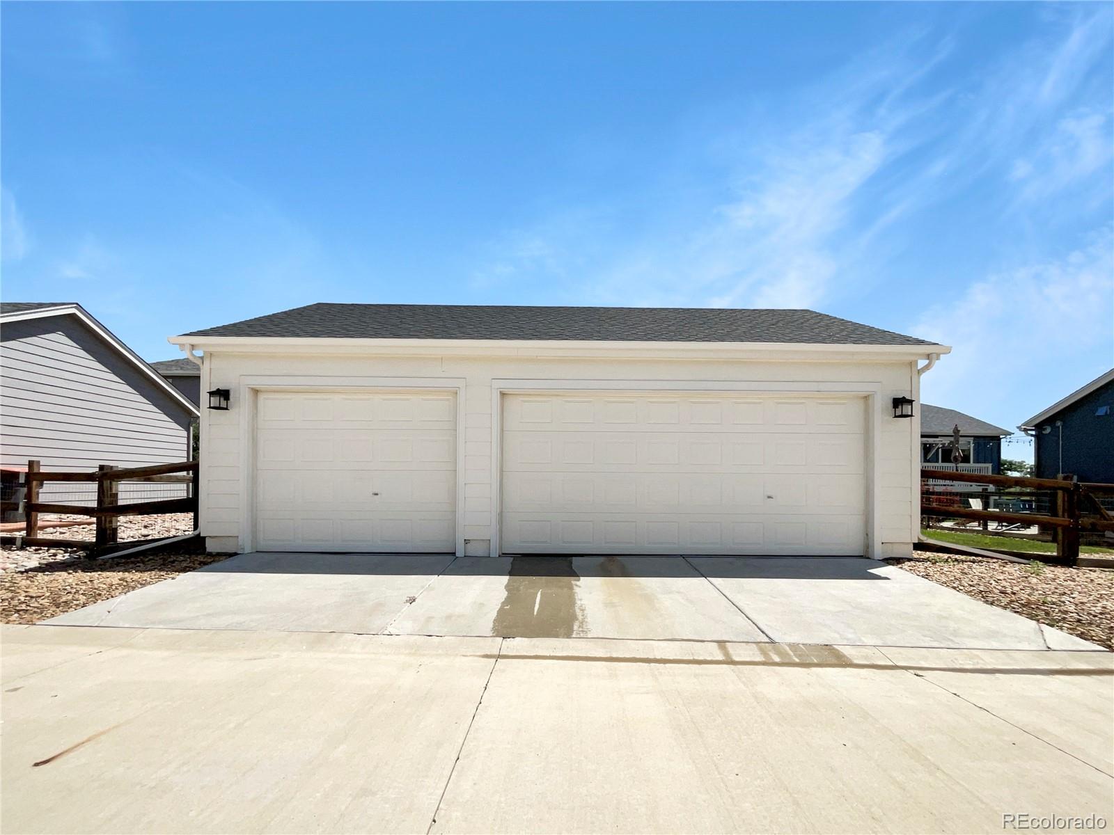 12825 Eagle River Road Firestone, CO 80504 - Photo 32 of 32 a view of a garage