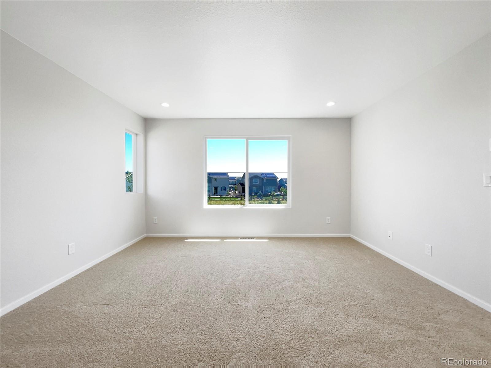 12825 Eagle River Road Firestone, CO 80504 - Photo 5 of 32 an empty room with a window