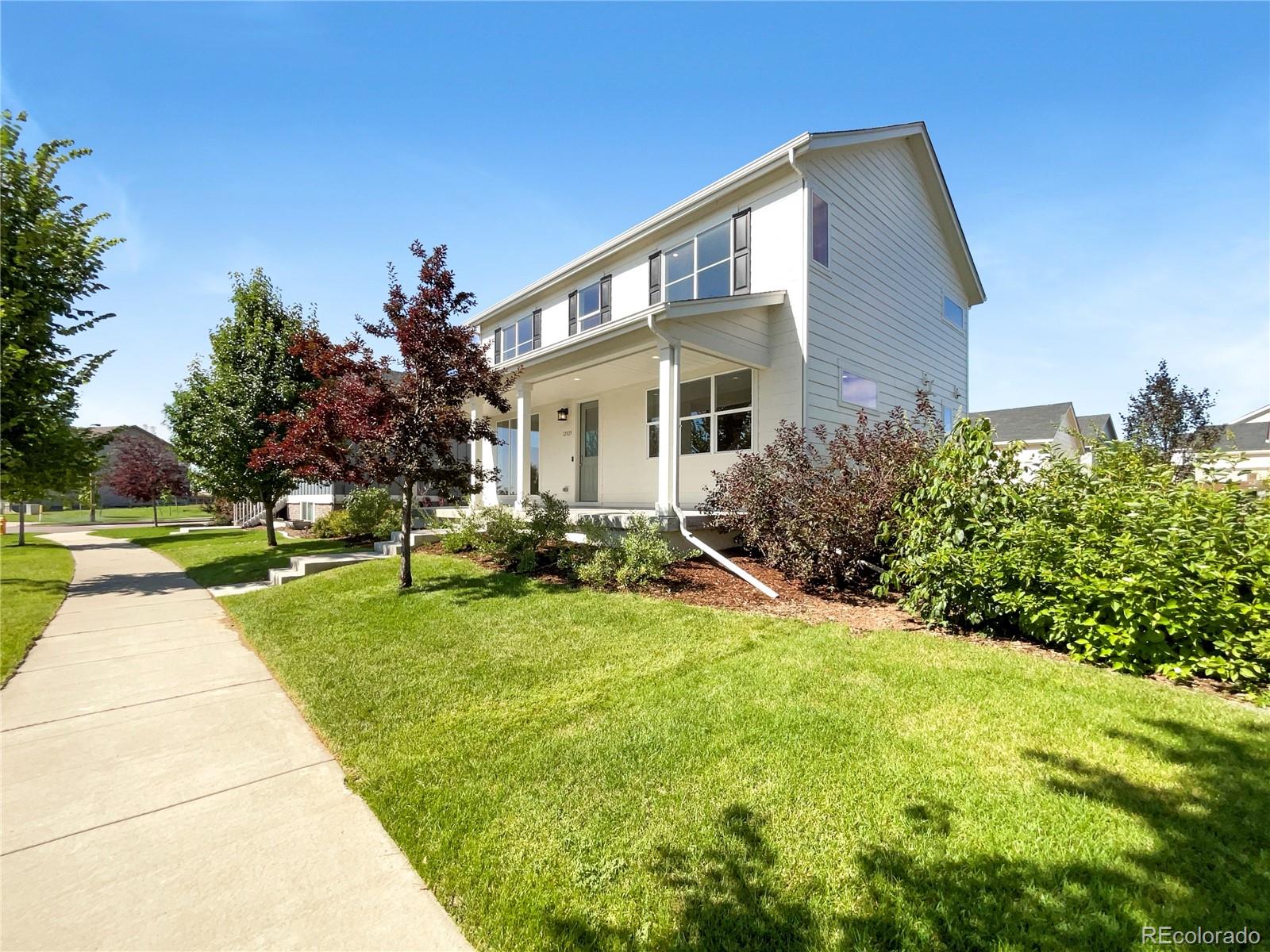 12825 Eagle River Road Firestone, CO 80504 - Photo 8 of 32 a view of backyard of house with green space