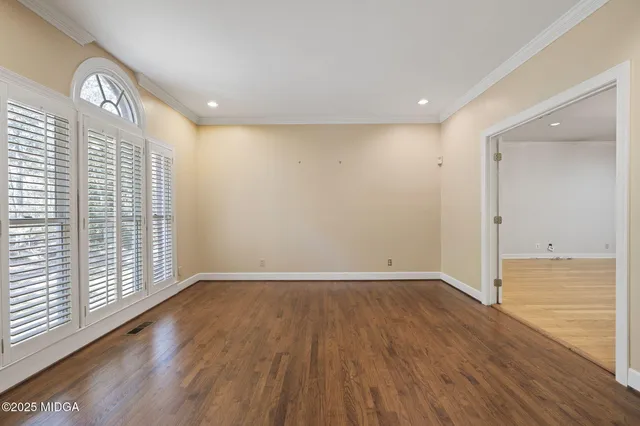 a view of a hallway with a chandelier