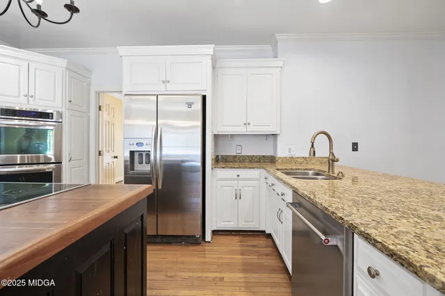 a view of a backyard with a swimming pool