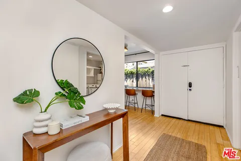 a view of entryway with wooden floor
