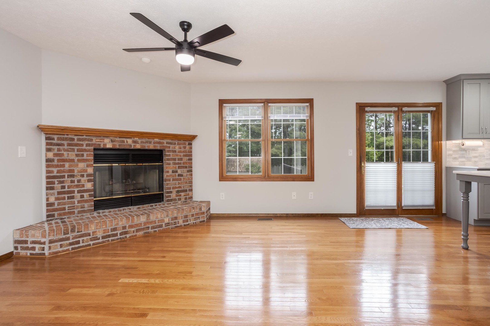 814 Landau Lane Normal, IL 61761 - Photo 15 of 58 a living room with furniture and a fireplace