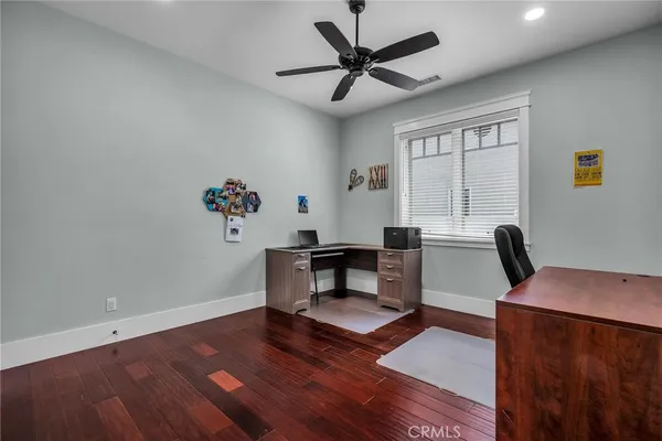 a workspace with wooden floor