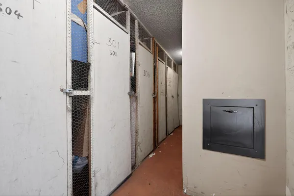 a view of a hallway with hallway and stairs