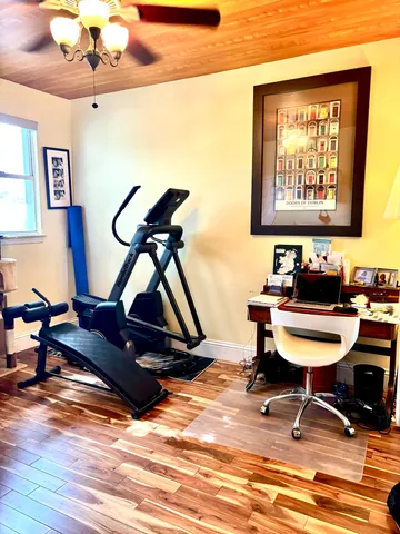 a room with furniture and wooden floor