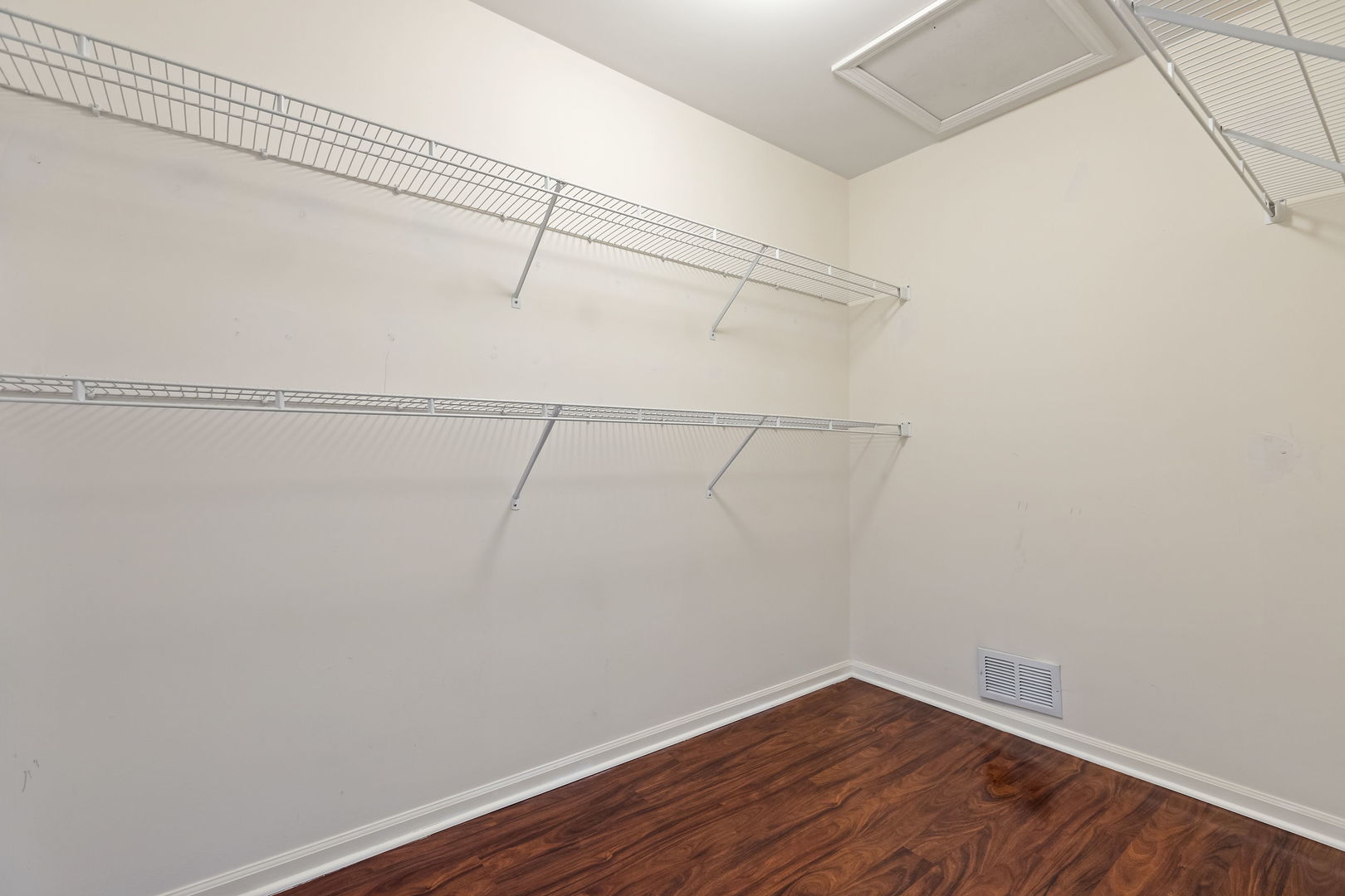 4875 Turnberry Drive Hoffman Estates, IL 60010 - Photo 15 of 22 a view of a room with racks on the wall