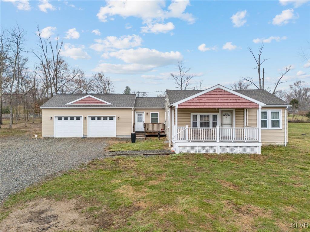 62 School Lane Reading, PA 19606 - Photo 1 of 33 a front view of a house with a yard