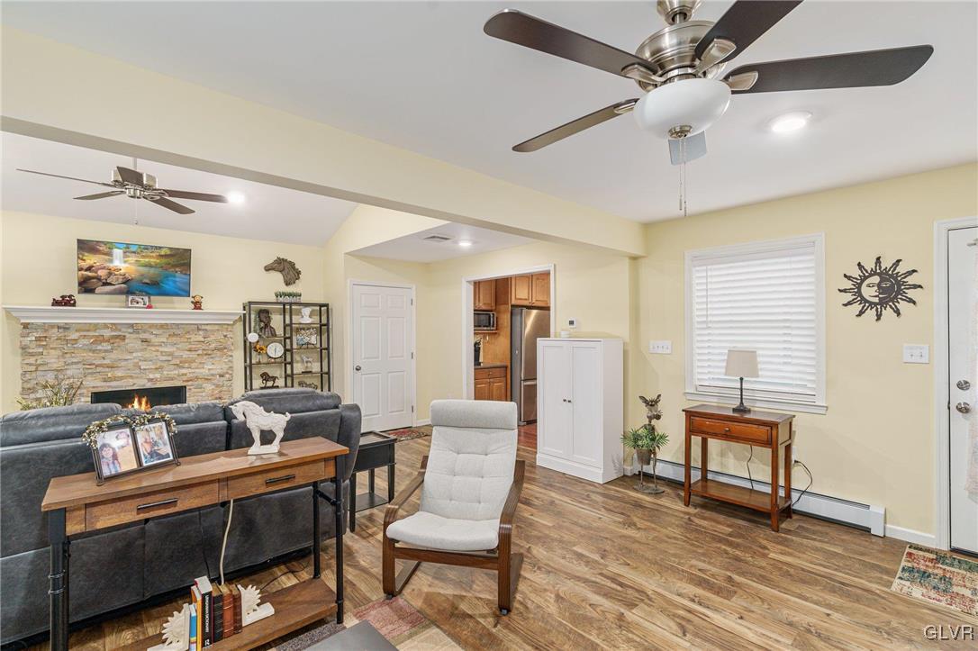 62 School Lane Reading, PA 19606 - Photo 13 of 33 a living room with furniture and a fireplace