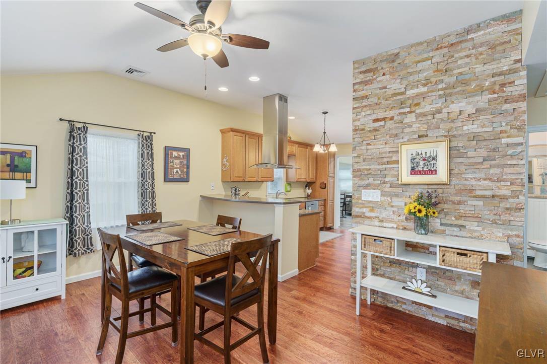 62 School Lane Reading, PA 19606 - Photo 20 of 33 a view of a dining room with furniture and wooden floor