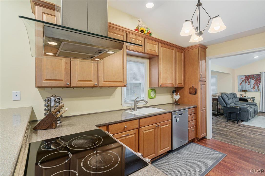 62 School Lane Reading, PA 19606 - Photo 24 of 33 a kitchen with stainless steel appliances granite countertop a sink stove and cabinets