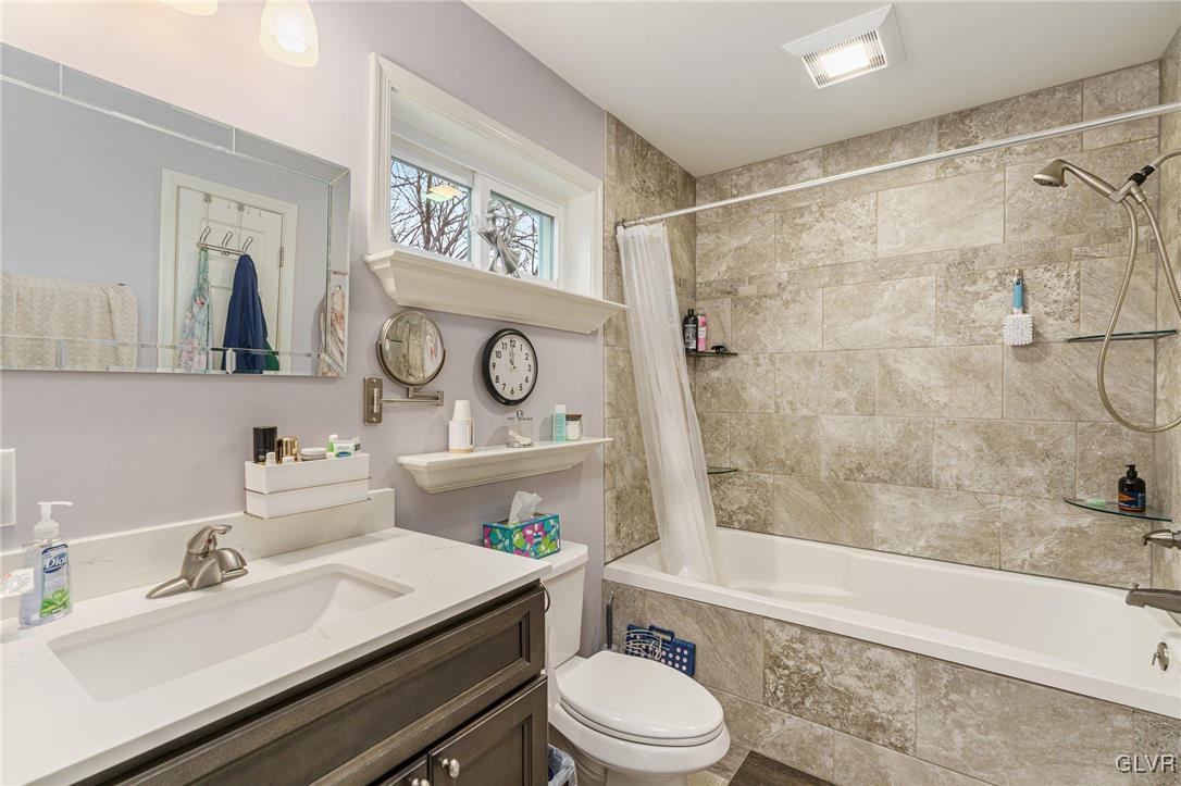 62 School Lane Reading, PA 19606 - Photo 27 of 33 a bathroom with a sink a toilet and a bathtub