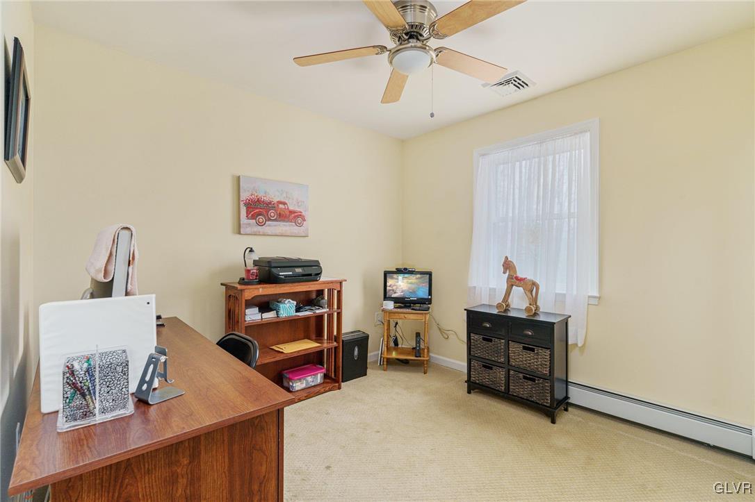 62 School Lane Reading, PA 19606 - Photo 29 of 33 a bedroom with furniture and a chandelier
