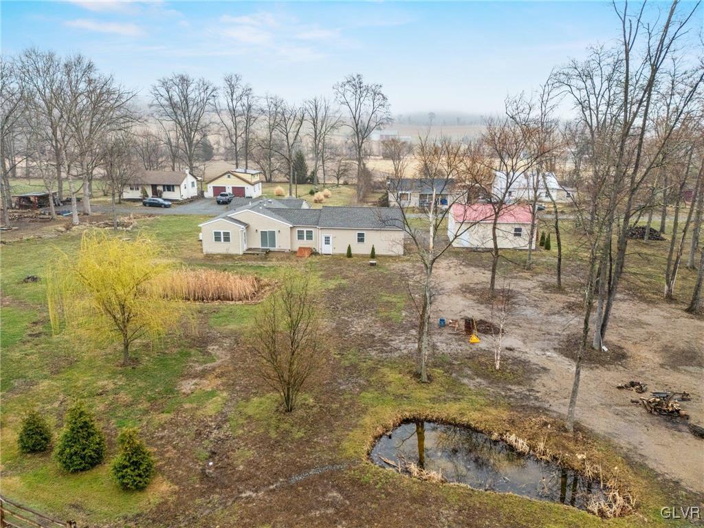 62 School Lane Reading, PA 19606 - Photo 5 of 33 a view of swimming pool next to a yard with trees