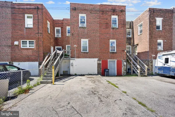 a view of a building with a park