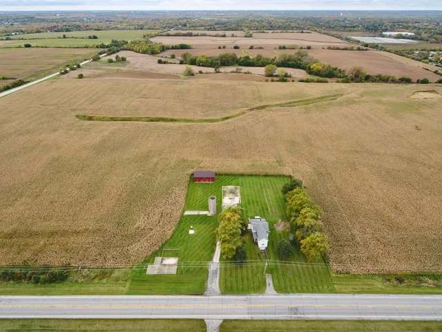 an aerial view of beach and yard
