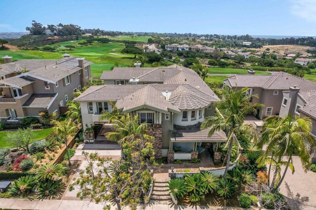 an aerial view of a house with a garden